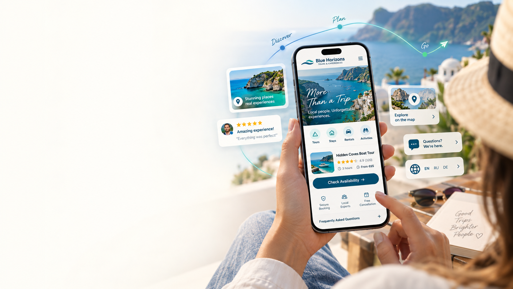 Travel website experience shown on a phone overlooking a Mediterranean coast